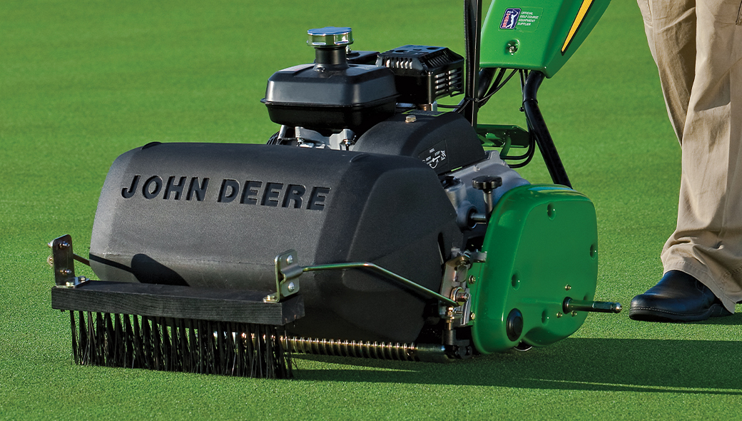 A close up of the optional out front push brush on the 180SL PrecisionCut™