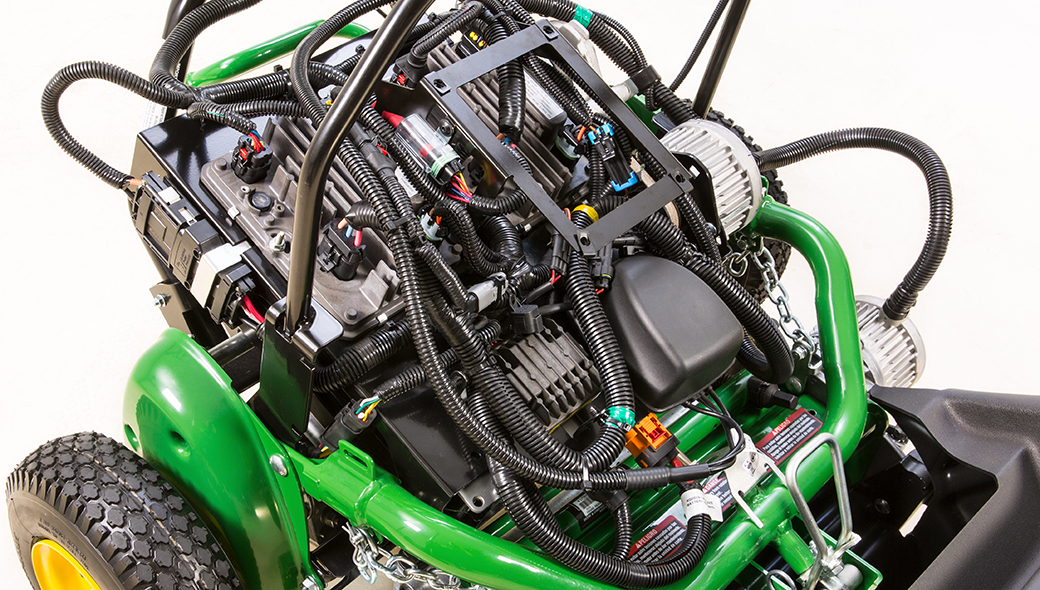 Close-up view of the electric engine on the 225 E-Cut Electric Walk Greens mower