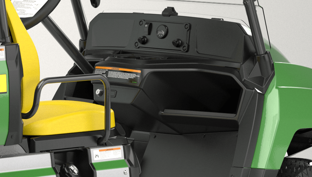 Close-up view of the various storage spaces in the Gator GS Gas Utility Vehicle