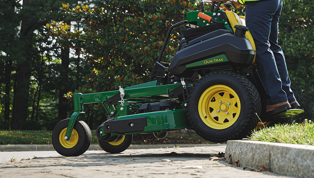 Man mowing with the QuikTrak Q820M