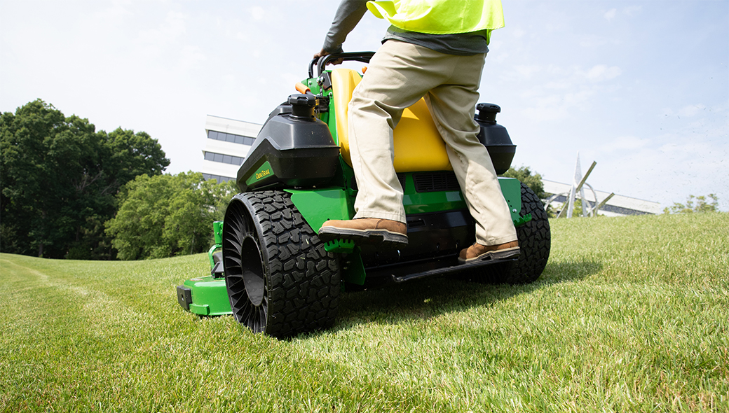 Man mowing with comfort on the QuikTrak Q865R EFI 